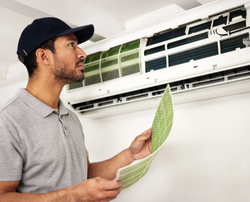 Engineer replacing Dirty Air Filters