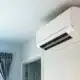 A room with a CO₂ Air Conditioning mounted on the wall